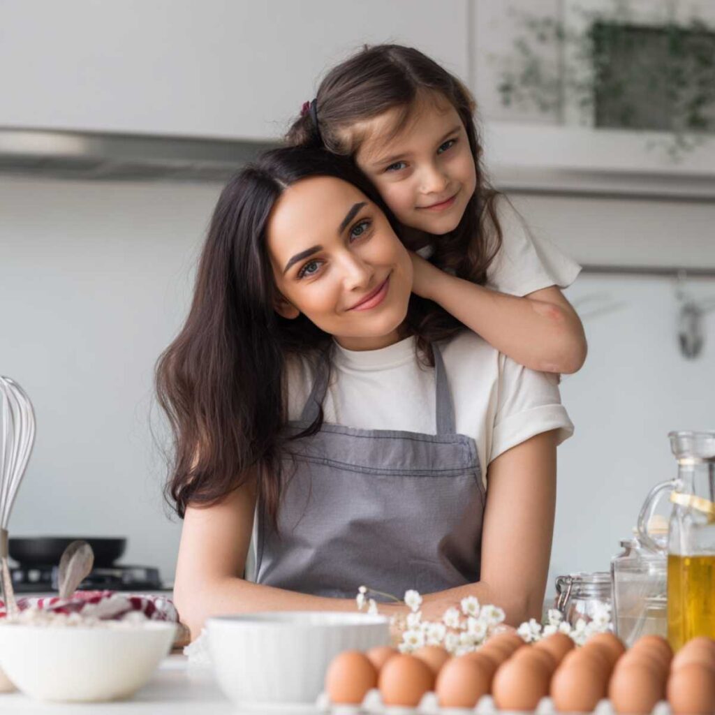 Jasmine baking with her daughter Olivia in the kitchen